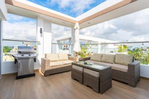 Posezení v ubytování Elegante y versátil apartamento en Ensanche Ozama SDE