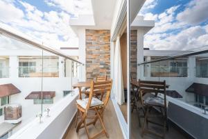 Balkón nebo terasa v ubytování Elegante y versátil apartamento en Ensanche Ozama SDE