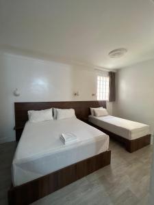 Katil atau katil-katil dalam bilik di Crystal hotel