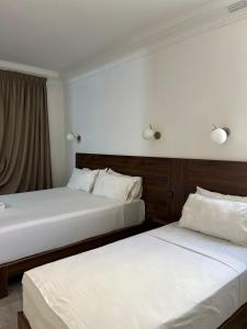 Katil atau katil-katil dalam bilik di Crystal hotel