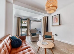 a living room with a couch and chairs and a table at Luxury B.one Apartment in Cavtat +62 photos