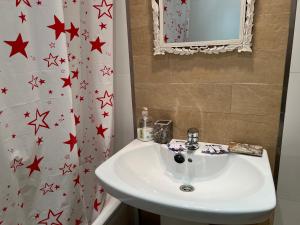 Ένα μπάνιο στο Apartamento Suite a pie de playa +23 φωτογραφίες