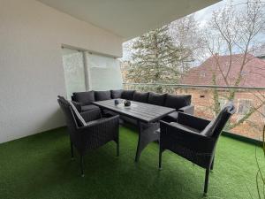 Гостиная зона в Villa Bauhaus Wellness Apartman 204