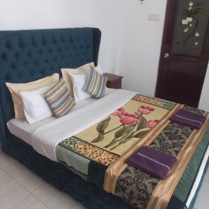 Postel nebo postele na pokoji v ubytování Pedro Resort & Bungalow Nuwara Eliya