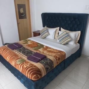Postel nebo postele na pokoji v ubytování Pedro Resort & Bungalow Nuwara Eliya