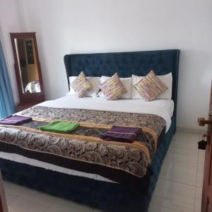 Postel nebo postele na pokoji v ubytování Pedro Resort & Bungalow Nuwara Eliya