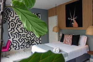 Postelja oz. postelje v sobi nastanitve Nomadia Coliving Boutique