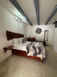 Postel nebo postele na pokoji v ubytování Hotel Mittoz Holbox