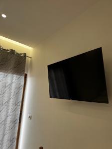 TV a/nebo společenská místnost v ubytování Vila Spiro