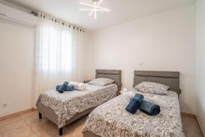 Postel nebo postele na pokoji v ubytování Maison Chataîgniers