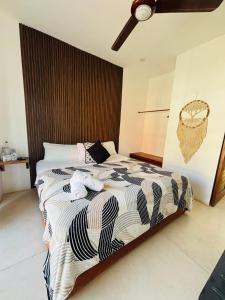 Postel nebo postele na pokoji v ubytování Hotel Mittoz Holbox