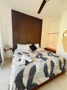 Postel nebo postele na pokoji v ubytování Hotel Mittoz Holbox