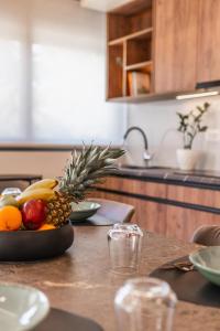 A kitchen or kitchenette at Margiani Studio & Apartment
