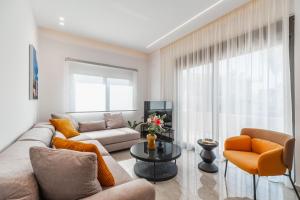 A seating area at Margiani Studio & Apartment
