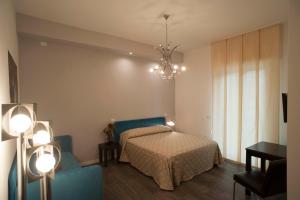 Кровать или кровати в номере B&B Corso Diaz