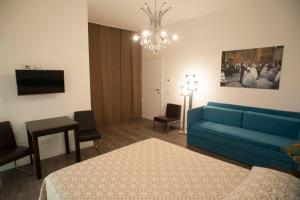 Телевизор и/или развлекательный центр в B&B Corso Diaz