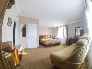 Postel nebo postele na pokoji v ubytování Galian Hotel + 37 fotografií