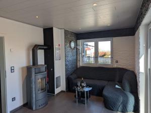 Kuchyň nebo kuchyňský kout v ubytování Ferienhaus Ausblick Am Eichenberg