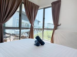 Ένα ή περισσότερα κρεβάτια σε δωμάτιο στο KWEN Loft - City Centre Imago 3BR l 2BR l Studio +277 φωτογραφίες