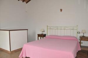 Postel nebo postele na pokoji v ubytování Agriturismo Renai e Monte II