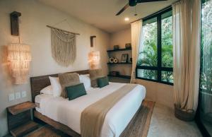 Postel nebo postele na pokoji v ubytování Jungle Boho Villa - Private Pool - Concierge 6B