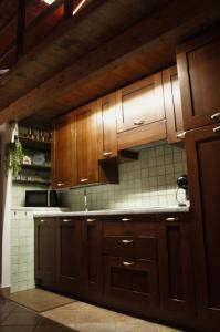 Kuchyň nebo kuchyňský kout v ubytování Locazione Turistica Casa Guelfa + 16 fotografií