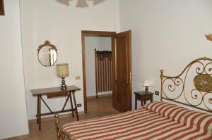 Postel nebo postele na pokoji v ubytování Agriturismo Renai e Monte II