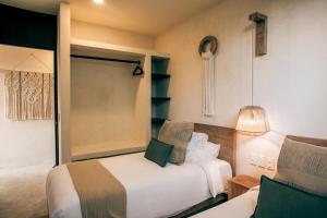 Postel nebo postele na pokoji v ubytování Jungle Boho Villa - Private Pool - Concierge 6B