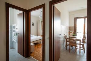 Postel nebo postele na pokoji v ubytování Talenti Boutique Apartment