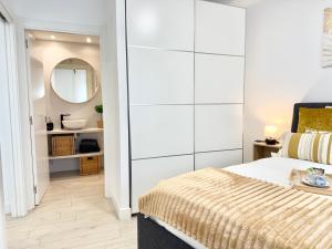 Posteľ alebo postele v izbe v ubytovaní Castro Holidays - Apto B Nuevo Céntrico con Garaje Gratis