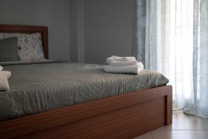 Postel nebo postele na pokoji v ubytování Cuka apartment 3BD nexto to metro and Piraeus Port