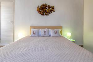Postel nebo postele na pokoji v ubytování Alguer Guest House