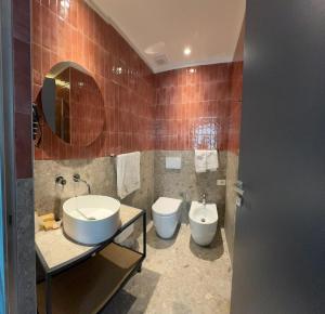 Phòng tắm tại Hotel Vitruvio