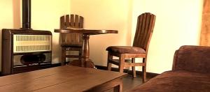 Posezení v ubytování CEDARS Resorts - Doodhpathri Kashmir