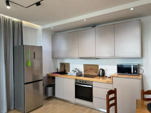 Η κουζίνα ή μικρή κουζίνα στο Dania Sea View Apartments