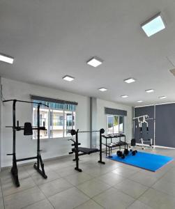 a gym with several equipment in a room at 365 Resorts in Kaki Bukit +33 photos