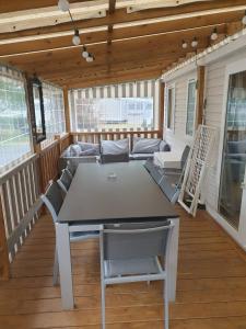 莱马特Mobil home climatisé 6,8 Pers SIBLU BONNE ANSE PLAGE LA PAMYRE LES MATHES的相册照片