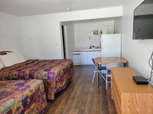 Kuchyň nebo kuchyňský kout v ubytování Elks Motel