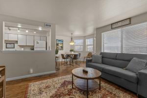 a living room with a couch and a table at Idaho Treasure Hunt in Boise