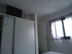 TV a/nebo společenská místnost v ubytování Acogedora habitación para mujeres viajeras