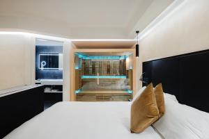 Postel nebo postele na pokoji v ubytování Dream Suite Trevi