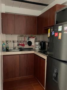 Køkken eller tekøkken på Central Vacation Apartment