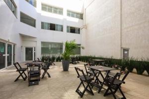Tri Hotel Executive Osório餐厅或其他用餐的地方