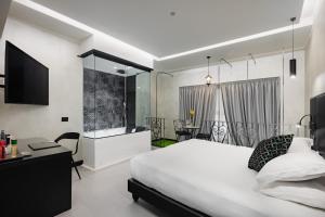 Postel nebo postele na pokoji v ubytování Dream Suite Trevi
