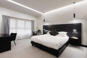 Postel nebo postele na pokoji v ubytování Dream Suite Trevi
