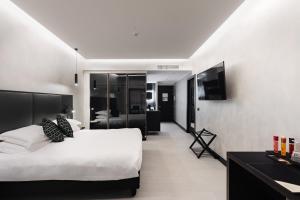 Postel nebo postele na pokoji v ubytování Dream Suite Trevi