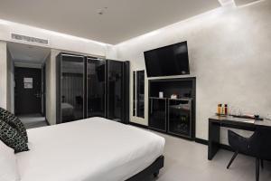 Postel nebo postele na pokoji v ubytování Dream Suite Trevi