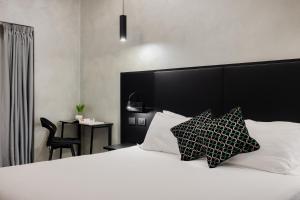 Postel nebo postele na pokoji v ubytování Dream Suite Trevi