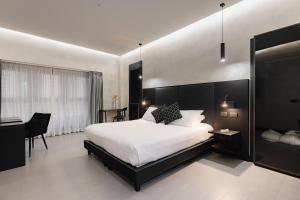 Postel nebo postele na pokoji v ubytování Dream Suite Trevi