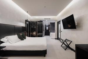 Postel nebo postele na pokoji v ubytování Dream Suite Trevi